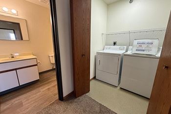 An apartment with an in-home washer and dryer.
